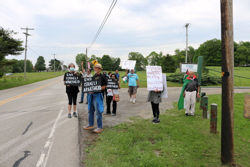 Protesters picket outside Combined Systems